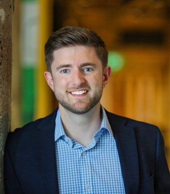 Portrait of Kris Schwab, Realtor.